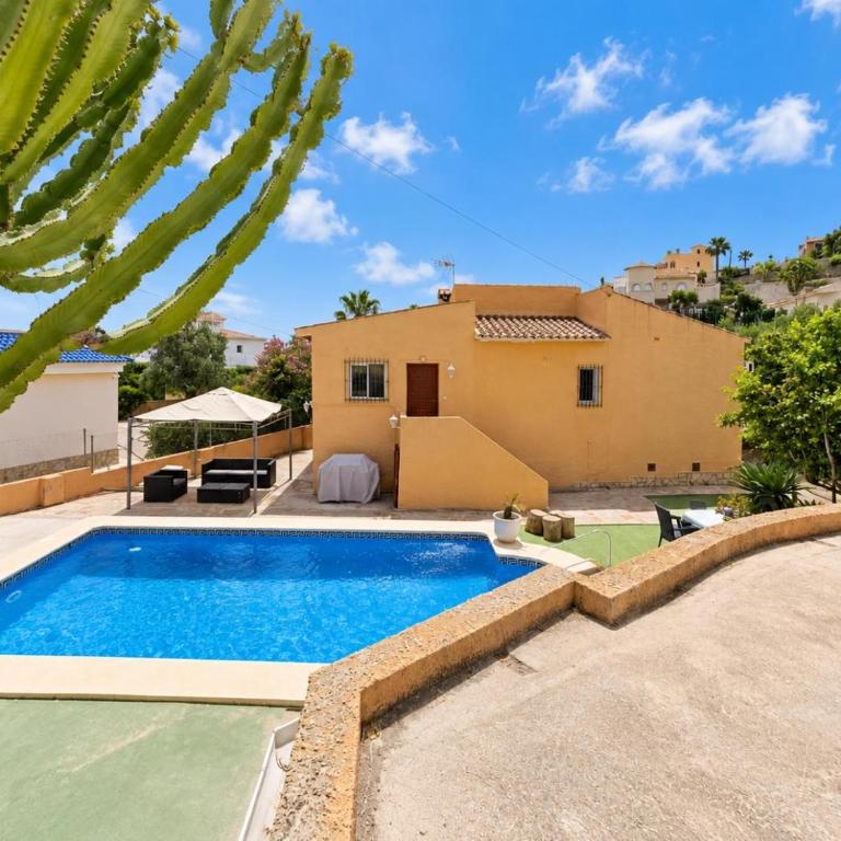 Casa de Playa con Piscina Estilo Rústico - Casa de 3 dormitorios - 25