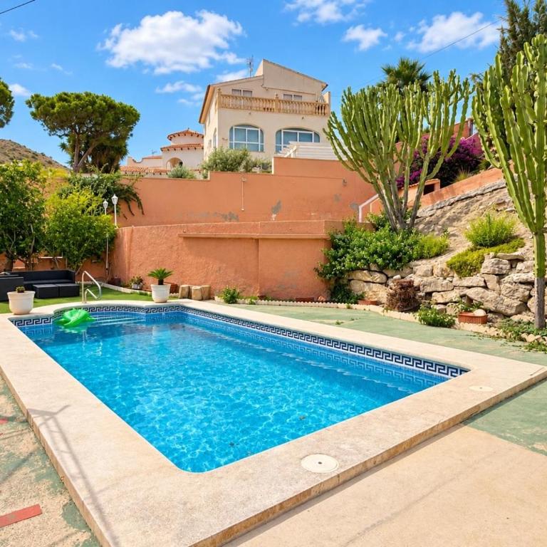 Casa de Playa con Piscina Estilo Rústico - Casa de 3 dormitorios - 34
