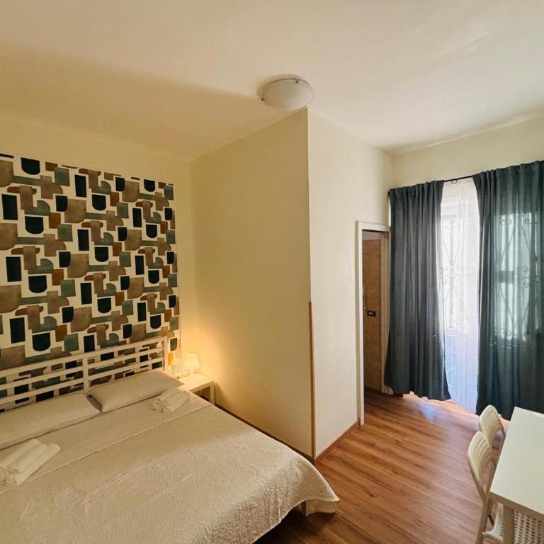 Eva Suites - Camera Matrimoniale con Bagno Privato - 1