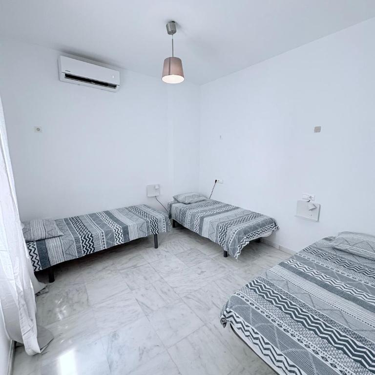The Spot Central Hostel - Cama individual en habitación compartida mixta de 3 camas - 1
