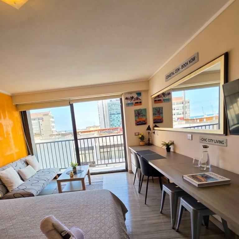 Suite Central A Pasos Del Mall con Vista hacia el mar - One-Bedroom Apartment - 12