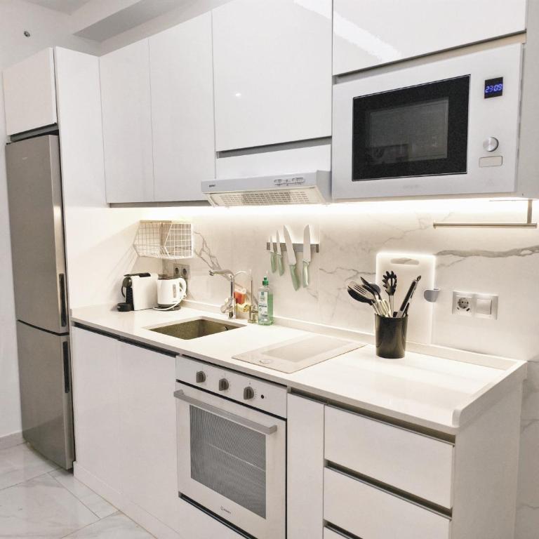 SleekLofts by City of Arts - Two-Bedroom Apartment with Terrace - 32
