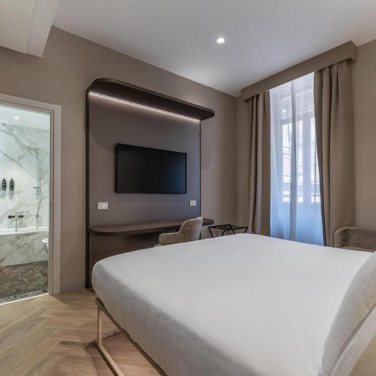 Hotel Raffaello - Sure Hotel Collection by Best Western - Deluxe Room with One King Bed and One Single Bed - 2