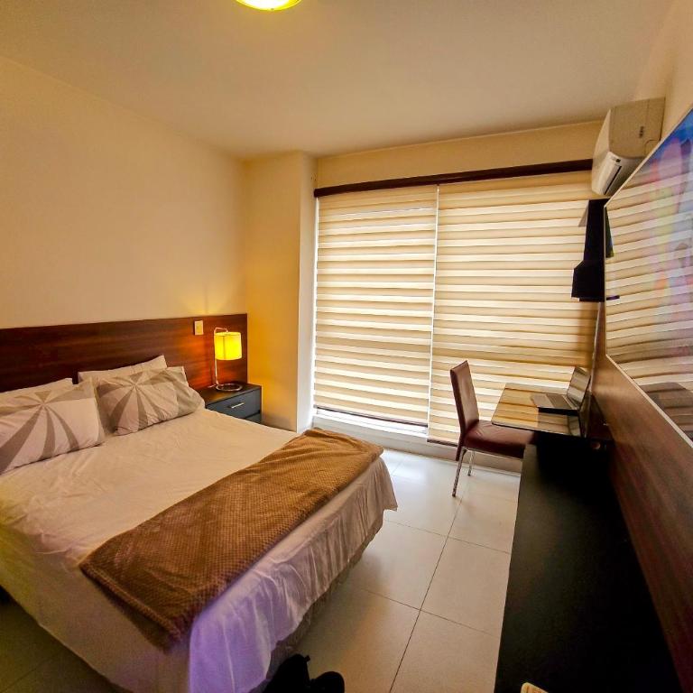 Apartamento céntrico con piscina y vista urbana - Apartamento de 1 dormitorio - 34