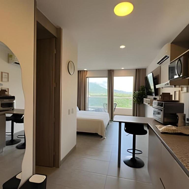 Apartamento con brisa, playa, arena y restaurante - Apartamento de 1 dormitorio - 14