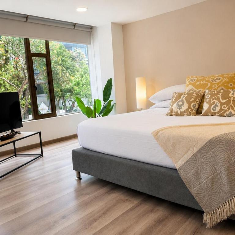 Bright King Studio ,Two blocks from Parque 93 - Estudio Deluxe con cama grande - 10