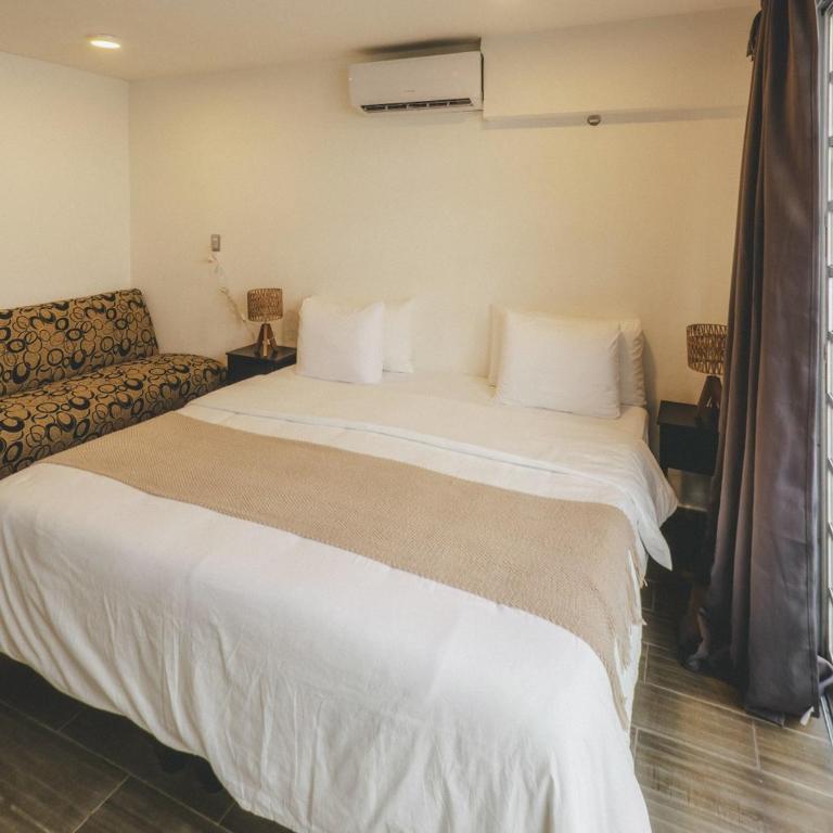 La Perle Noire - Dive Hotel Cozumel - Habitación con cama extragrande. - 20