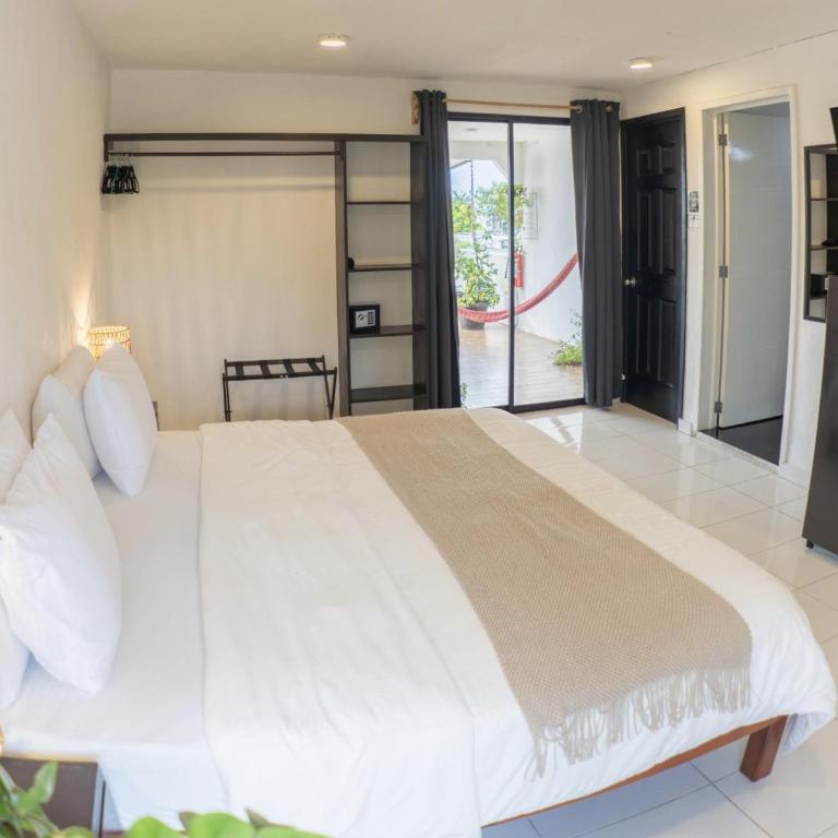 La Perle Noire - Dive Hotel Cozumel - Habitación con cama extragrande. - 21