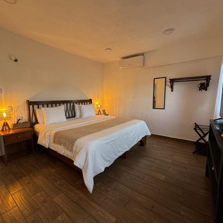 La Perle Noire - Dive Hotel Cozumel - Habitación con cama extragrande. - 2