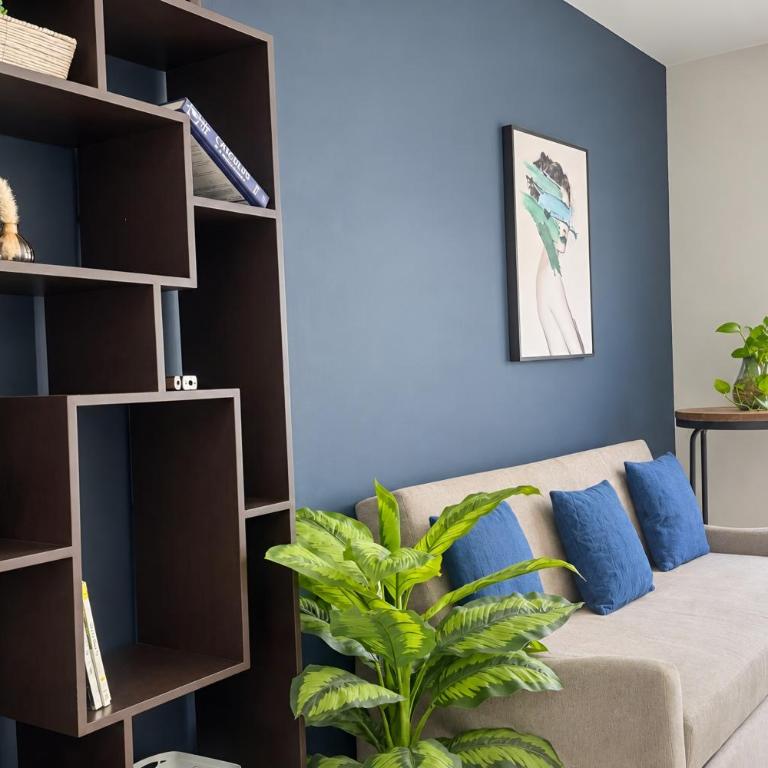 Luz, plantas y dos camas por recámara, Americana - Apartamento de 2 dormitorios - 58