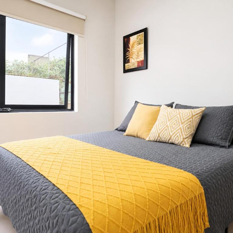 Luz, plantas y dos camas por recámara, Americana - Apartamento de 2 dormitorios - 62