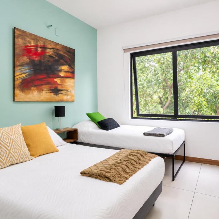 Para 8 con dos baños completos, Americana - Apartamento de 2 dormitorios - 80