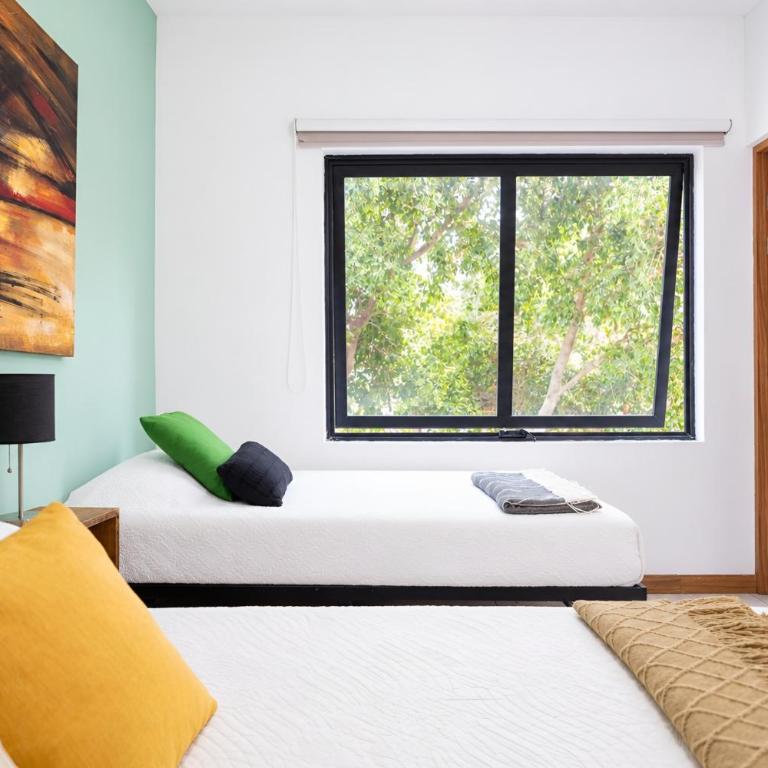 Para 8 con dos baños completos, Americana - Apartamento de 2 dormitorios - 81
