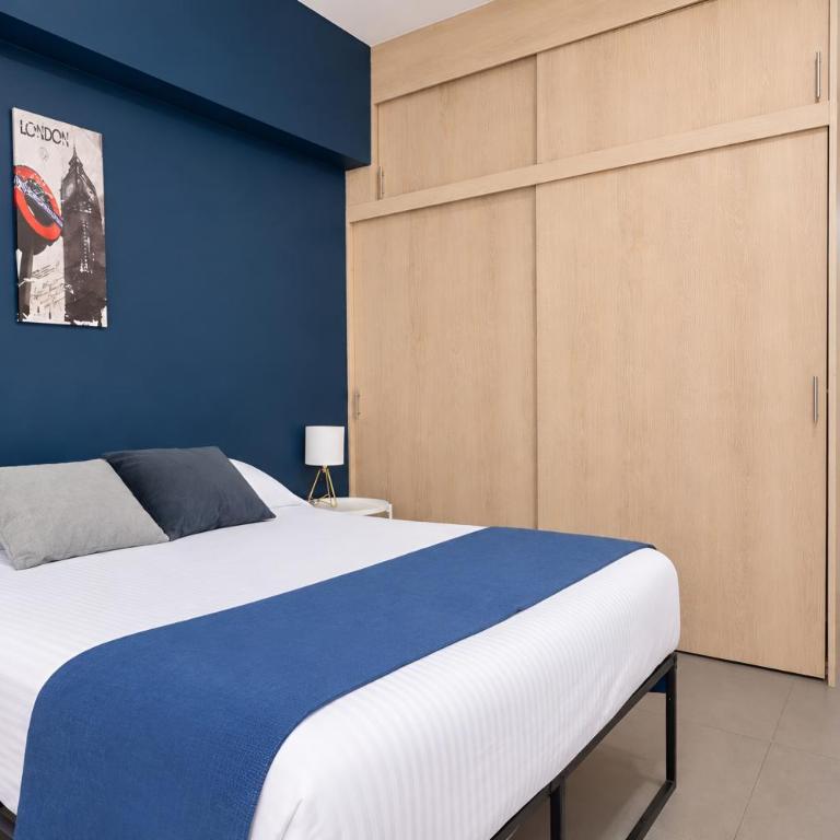 Terraza privada al skyline y 2 cajones, Americana - Two-Bedroom Apartment - 32