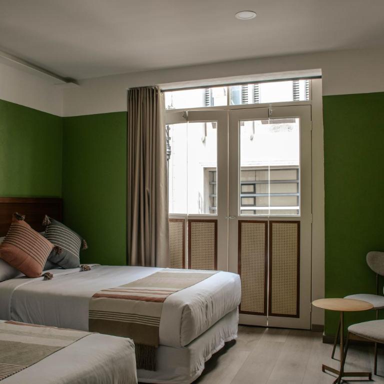 Toto Hotel - Habitación Doble con balcón - 2 camas - 1