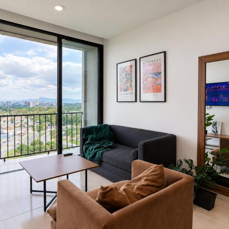 Depa en piso 10 con vista, cerca del Akron - Two-Bedroom Apartment - 1