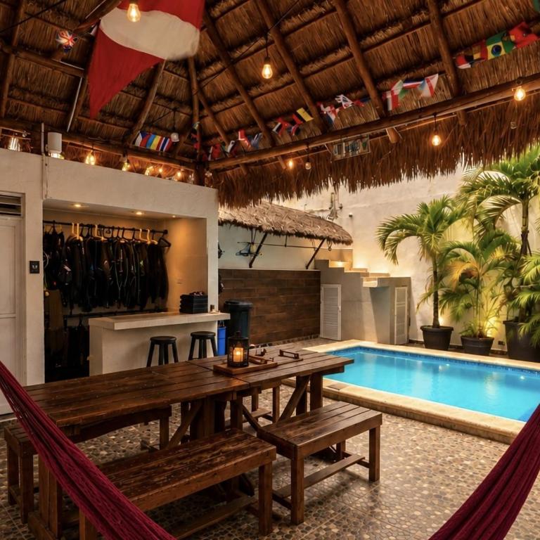 La Perle Noire - Dive Hotel Cozumel - Habitación con cama extragrande. - 3