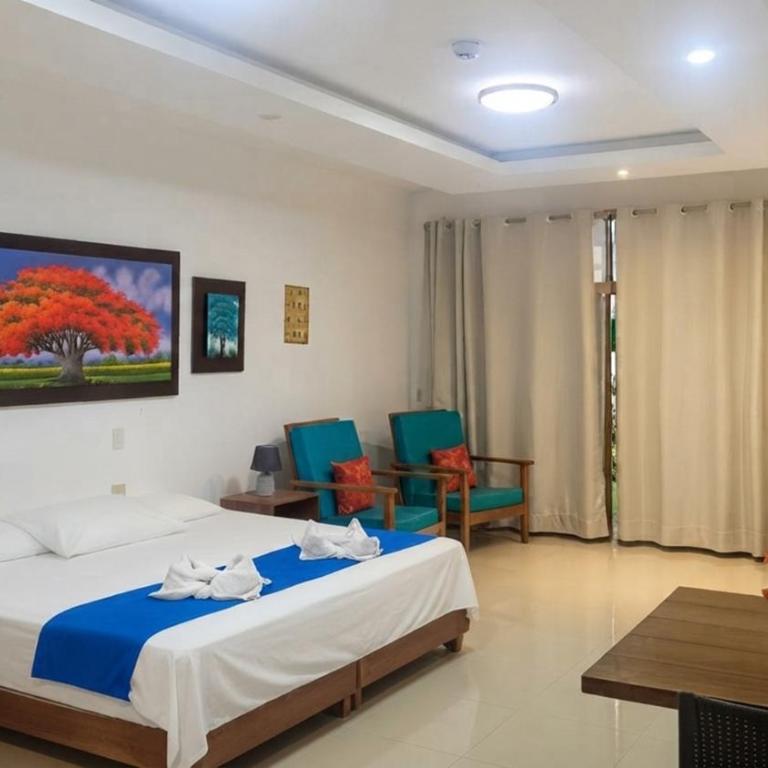 Galápagos Isabela Hotel Loja - Habitación Cuádruple Deluxe - 9