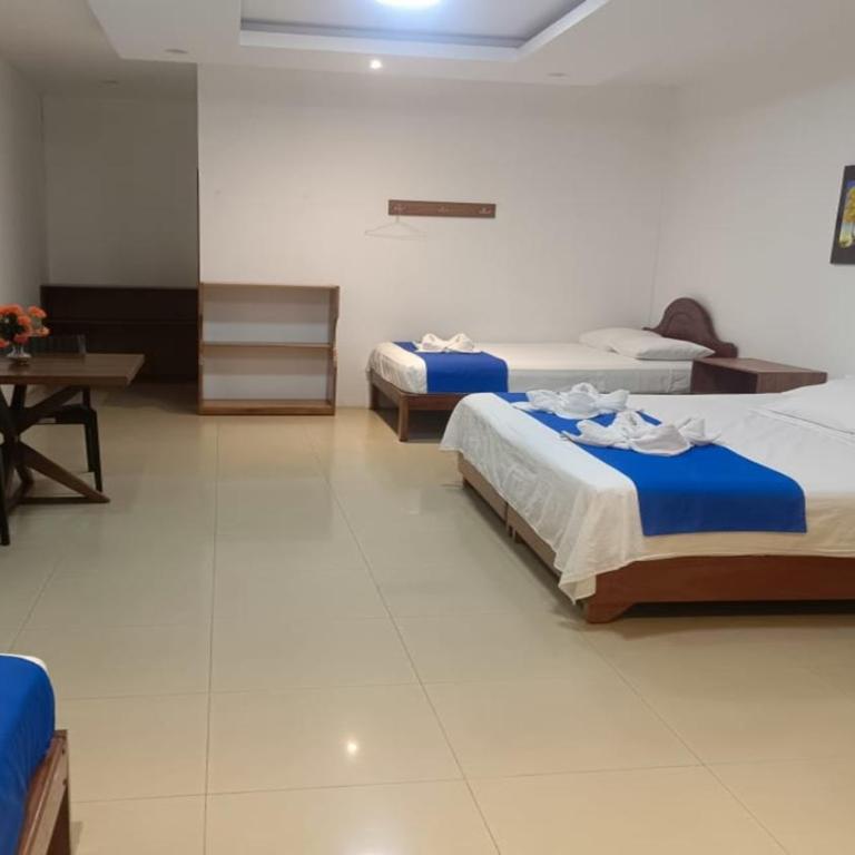 Galápagos Isabela Hotel Loja - Habitación Cuádruple Deluxe - 10