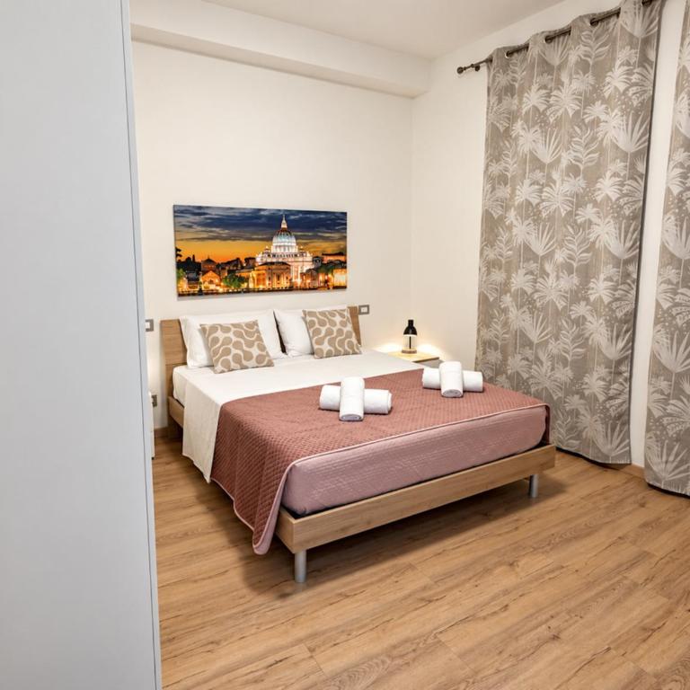 NONNA ELISA I Apartment - Cozy & quiet stay, comfortable home in a peaceful residential area, near Battistini Metro A, easy Vatican access & direct connection to Rome city centre - Two-Bedroom Deluxe Apartment - 40