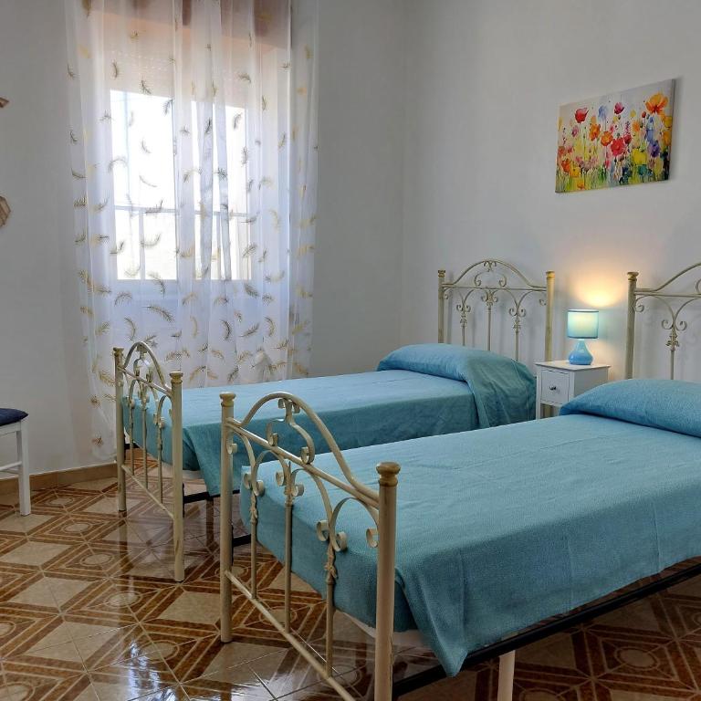 La veranda dei nonni - Appartamenti in villetta vicino al mare - Appartamento con 2 Camere da Letto e Vista Giardino - 8