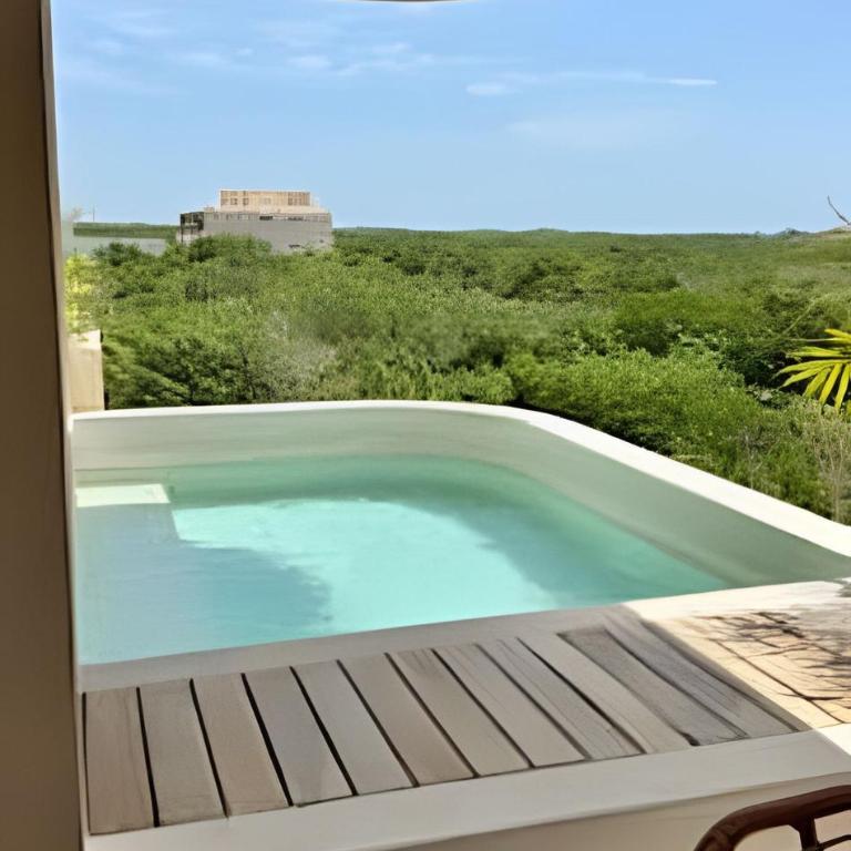 Mayan View Tulum - Two-Bedroom Deluxe Apartment with Garden View - 10