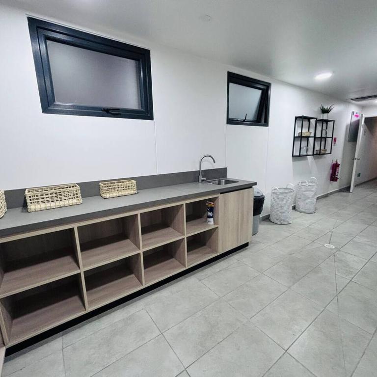 Depto. 2 Dormitorio y 2 baños, AC, parking, Ñuñoa - Apartamento - 31