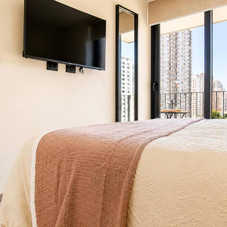 Depto. 2 Dormitorio y 2 baños, AC, parking, Ñuñoa - Apartamento - 54