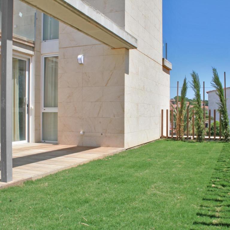 L' Escala Resort - Apartamento Cuádruple con jardín - 3