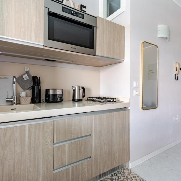 AP SUITE Appartamento Vista Lago di Garda con Piscina e Garage - Appartamento con 1 Camera da Letto - 4