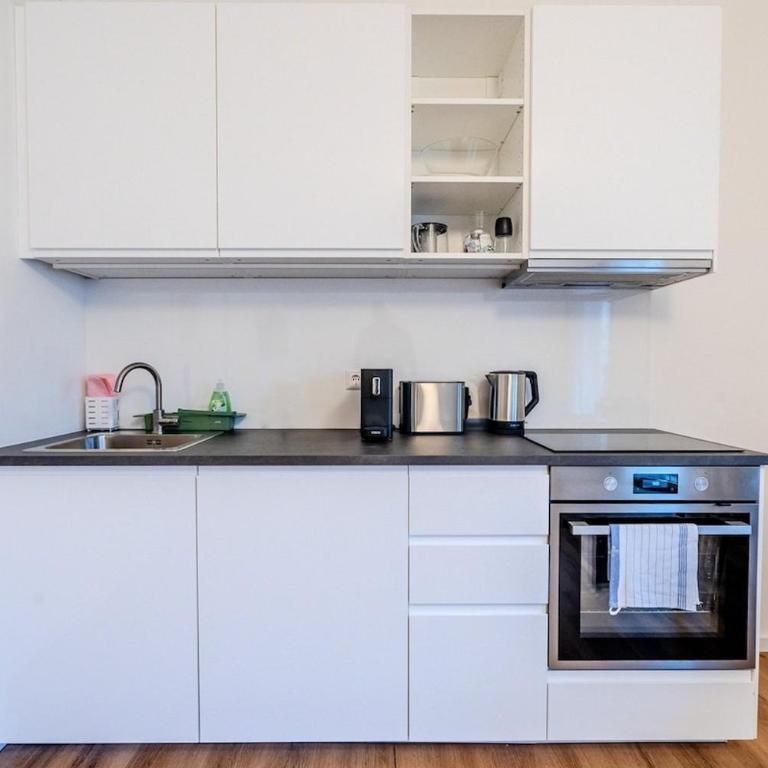 NOOR Studio with Balcony Lend Parking Option - One-Bedroom Apartment - 14