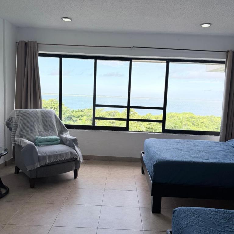 Beachfront 1BR Beach & Pool Lagoon Sunset View Hotel Zone - One-Bedroom Apartment - 21
