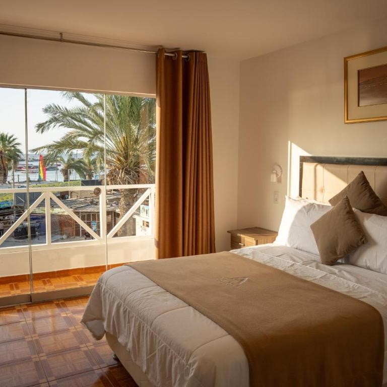 Antana Hostal Paracas - Habitación con cama grande y vistas al mar - 8