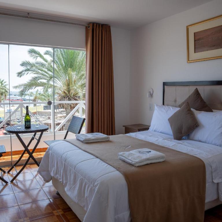 Antana Hostal Paracas - Habitación con cama grande y vistas al mar - 7