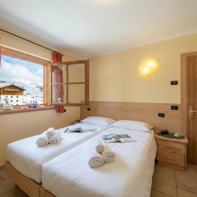 Sponda Ski in- Ski out 50m - Happy Rentals - Apartment mit Balkon - 8