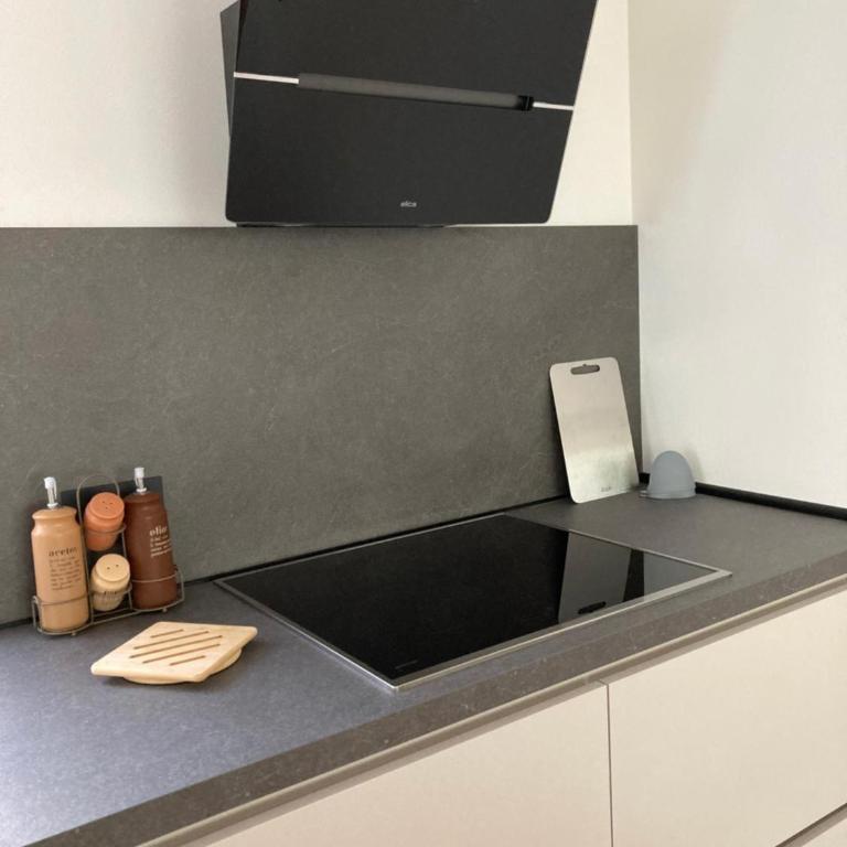 Pe De Munt Apartments - Two-Bedroom Deluxe Apartment with Garden View - 11