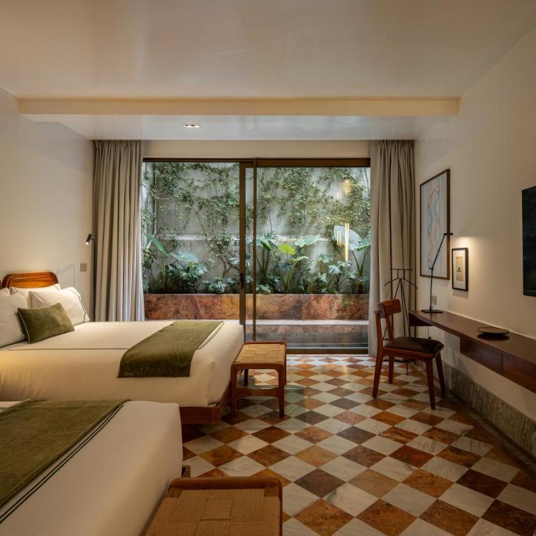 Hotel Dama - Suite Lit Queen-Size Deluxe - 1