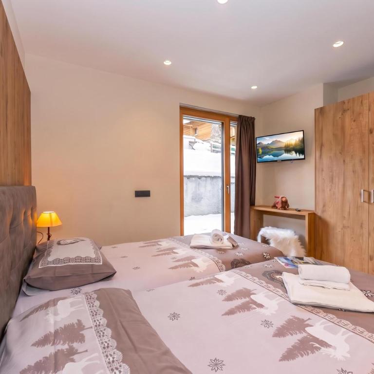 Casa Giardino Ski in - Ski out 100m - Apartamento con terraza - 10
