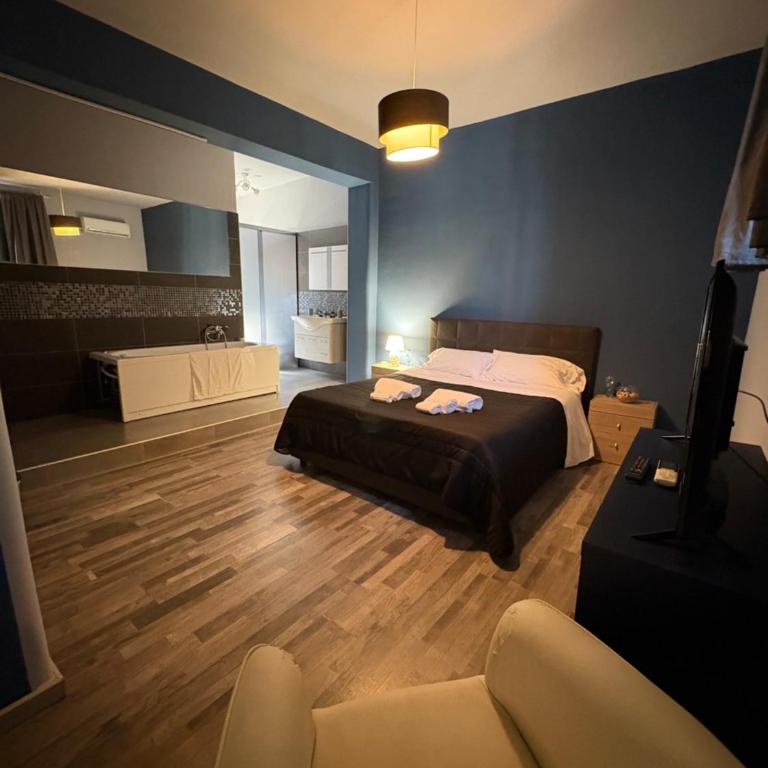 Casa tua suites - Camera Matrimoniale con Vasca Idromassaggio - 12