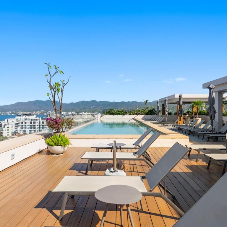 Cozy 1BR Bucerías stay with pool, gym, WiFi & kitchenette - Casa - 14