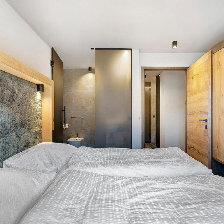 Angerle Alm Apt Latemar - Deluxe-Apartment mit 2 Schlafzimmern und Gartenblick - 24