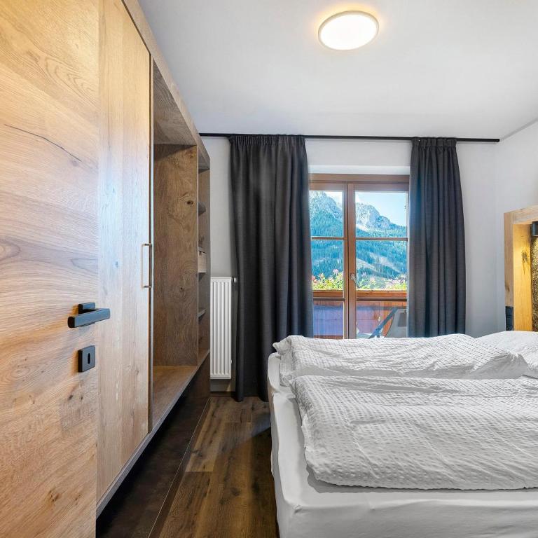 Angerle Alm Apt Latemar - Deluxe-Apartment mit 2 Schlafzimmern und Gartenblick - 19