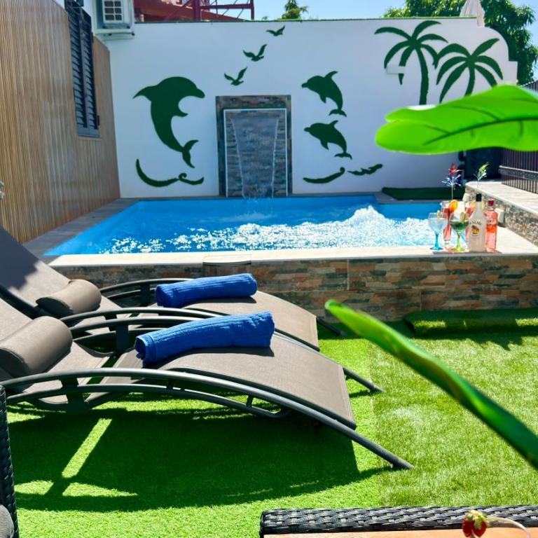 Villas Puerto Rico in front of the shopping center with private heated saltwater pool with jacuzzi function & arcade games - Villa Estándar - 9