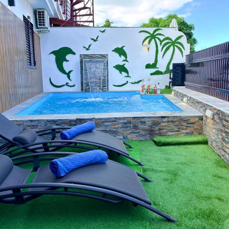 Villas Puerto Rico in front of the shopping center with private heated saltwater pool with jacuzzi function & arcade games - Villa Estándar - 10