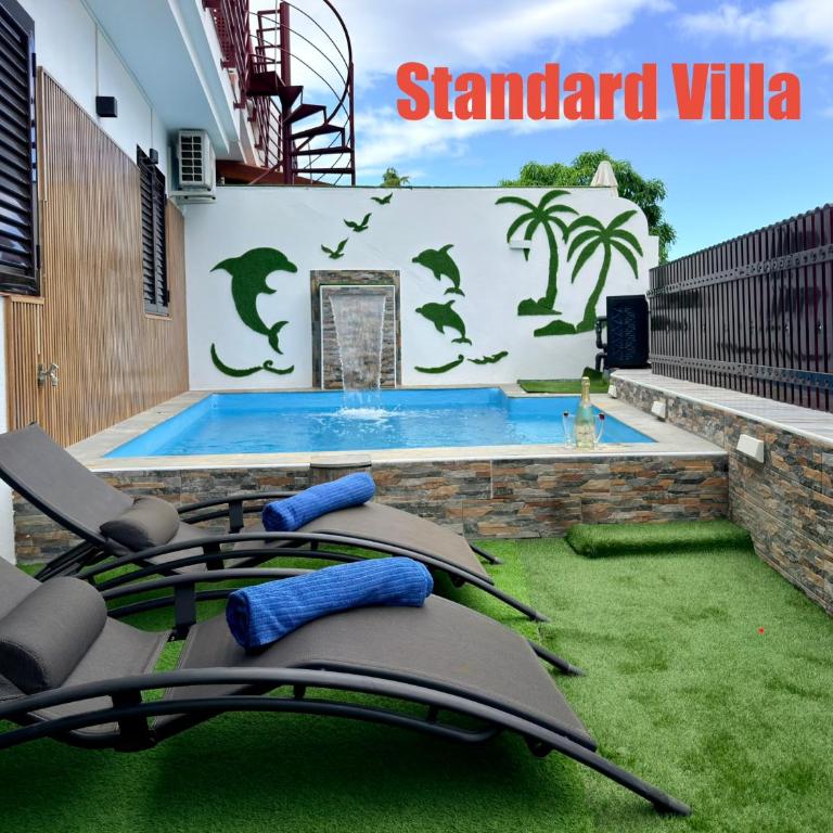 Villas Puerto Rico in front of the shopping center with private heated saltwater pool with jacuzzi function & arcade games - Villa Estándar - 1