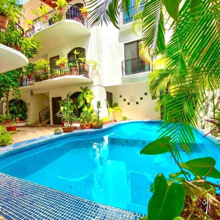 Caribbean Family Escape 2BR Close 5th av and Beach Rooftop hotel - Apartamento de 2 dormitorios con balcón - 5