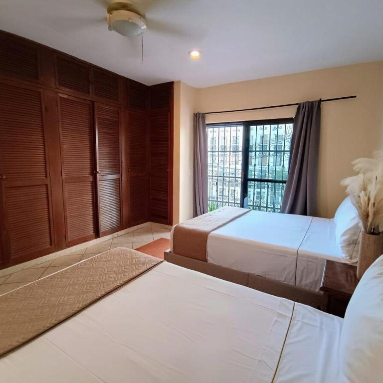 Caribbean Family Escape 2BR Close 5th av and Beach Rooftop hotel - Apartamento de 2 dormitorios con balcón - 4