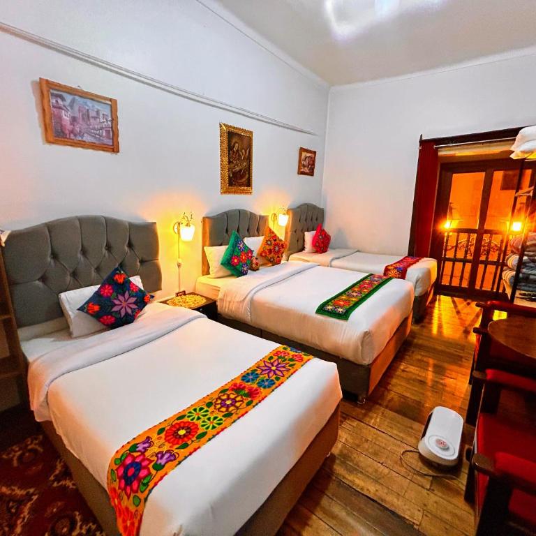 Hotel Casona Ecoterra Cusco - Habitación Triple con vistas a la ciudad - 1