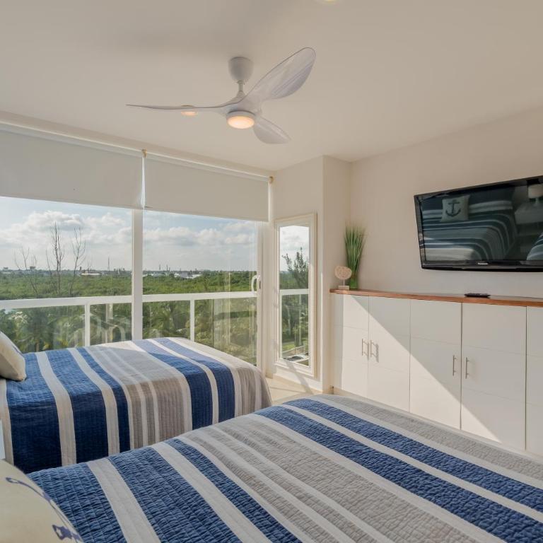 NAUTICA Beachfront 1 BDR with pool by Casa Paraiso - Apartment mit 1 Schlafzimmer, Balkon und Stadtblick - 18