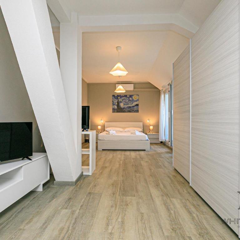 Penthouses with Parking and terraces in Palazzo San Paolo By ML WHITE HOUSE - Two-Bedroom Apartment with Balcony and Terrace - 1